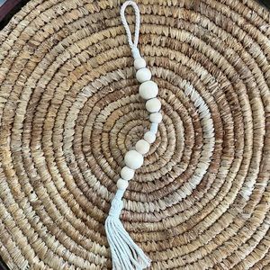 Wooden bead corded decoration
